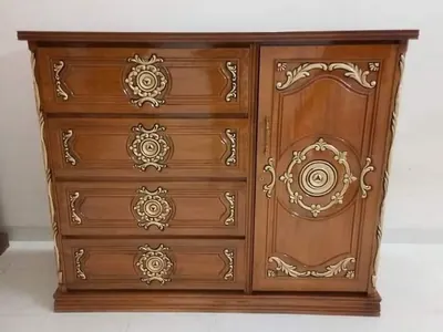 Carved wooden cabinet in the workshop