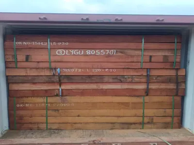 Sawn timber blocks stacked in a shipping container