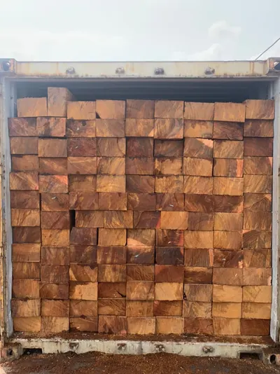 Sawn timber squares filling a container